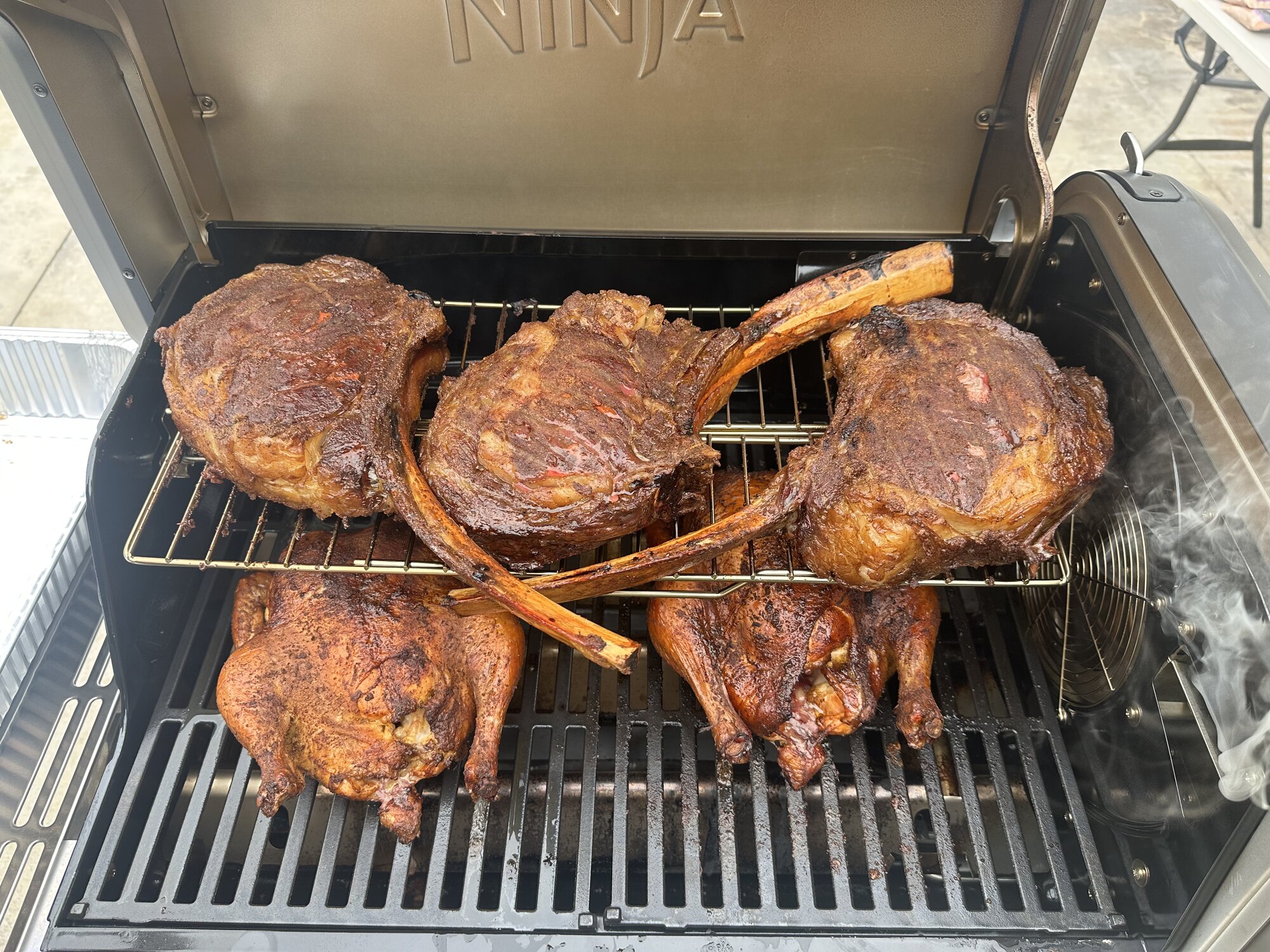 Live-fire smoked tomahawk